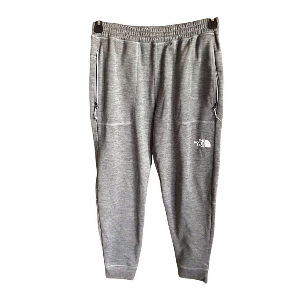 The North Face Gray sweatpants athletic SZ   Small zip pockets Men’s